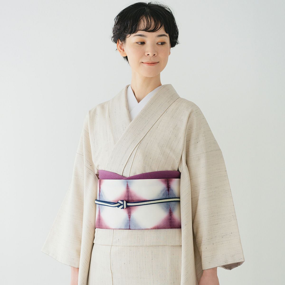 CHIKUMO-千雲-】正絹桐生絞り名古屋帯 臙脂×薄青 板締め くるり｜着物