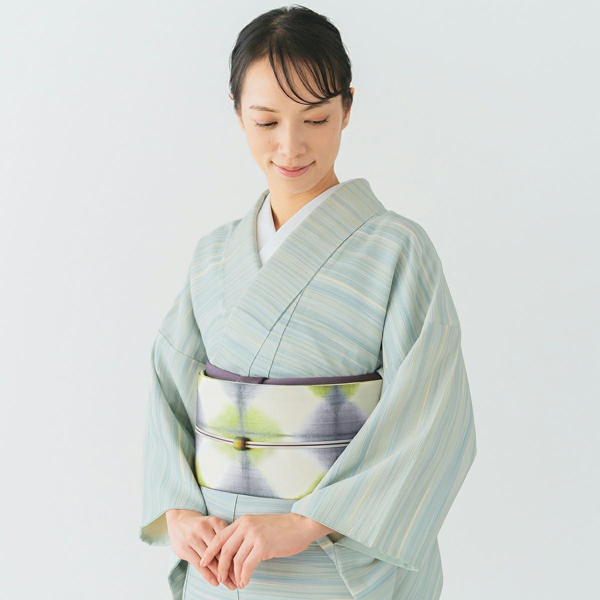 CHIKUMO-千雲-】正絹桐生絞り名古屋帯 黄緑x薄青 板締め くるり｜着物