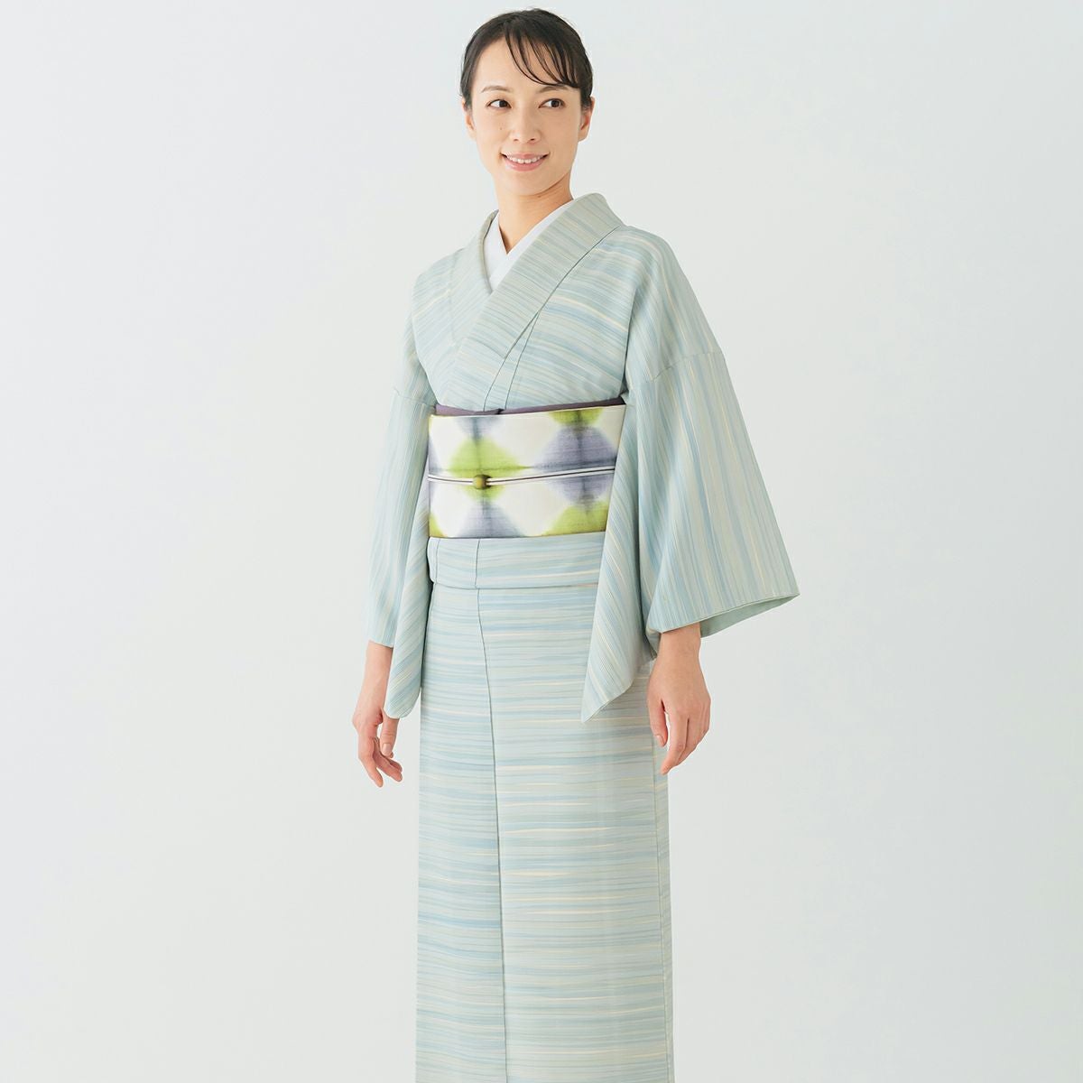 CHIKUMO-千雲-】正絹桐生絞り名古屋帯 黄緑x薄青 板締め くるり｜着物